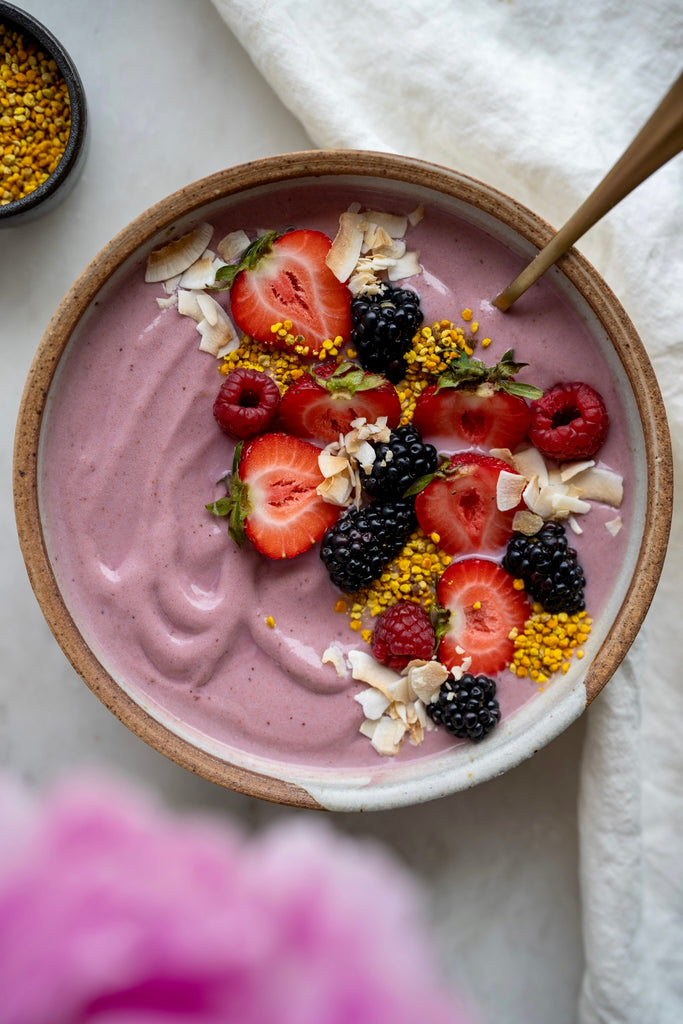 Superfruit smoothie bowl with strawberries and bee pollen