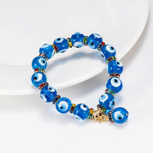 Sky blue glass beads on a rhodiumplated sterling silver bracelet  Laval  Europe