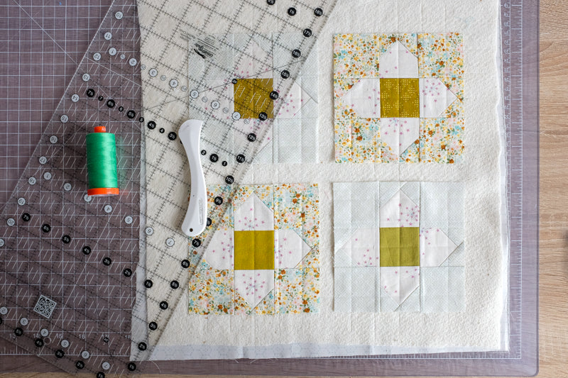 Blooming Scraps Quilt Scrappy Coasters Tutorial by The Weekend Quilter Marking Quilting guidelines with heramarker