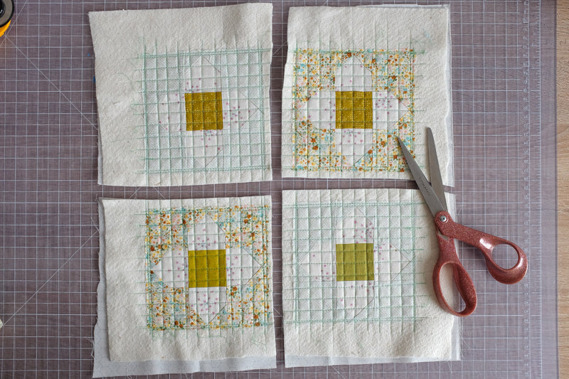Blooming Scraps Quilt Scrappy Coasters Tutorial by The Weekend Quilter Trimming Quilt Sandwiches