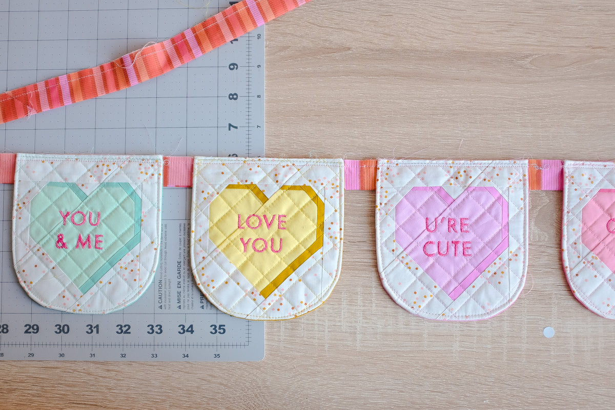 Sweet Notes Valentine’s Day heart candy quilted Bunting Tutorial by The Weekend Quilter