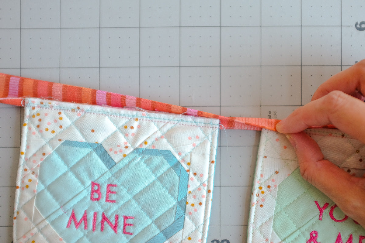 Sweet Notes Valentine’s Day heart candy quilted Bunting Tutorial by The Weekend Quilter