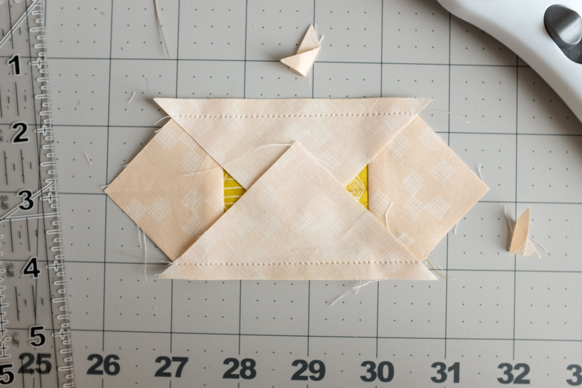 The Weekend Quilter tutorial how-to make and square up (or trim) square-in-a-square block unit sew triangle to unit