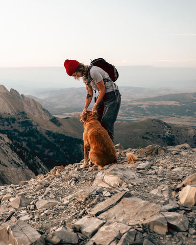 woman and dog on a hike