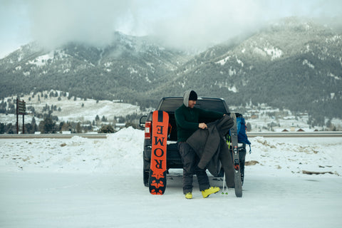 snowboarder preparing to hit the slopes