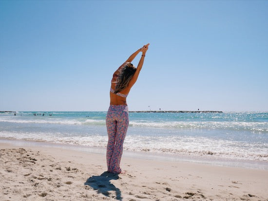 5 Restorative Yoga Poses for The Beach – Philosophie