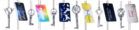 Assorted journey key charms on ball chains