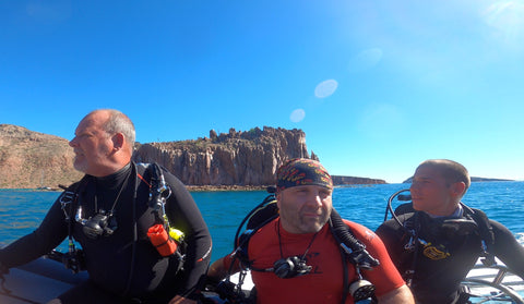 Zipping on the smaller panga from the live aboard to our dive site