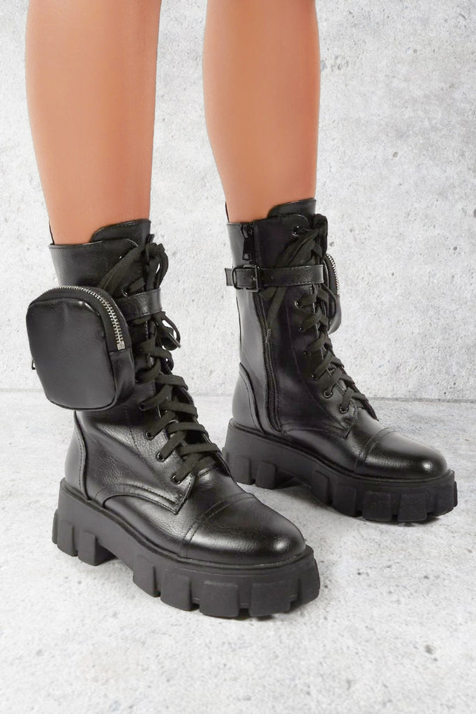 black cleated boots