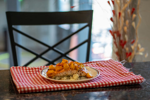 Jam Glazed Salmon Filet with Handmade Pueblo Chile Peach Jam topped with fresh peaches 