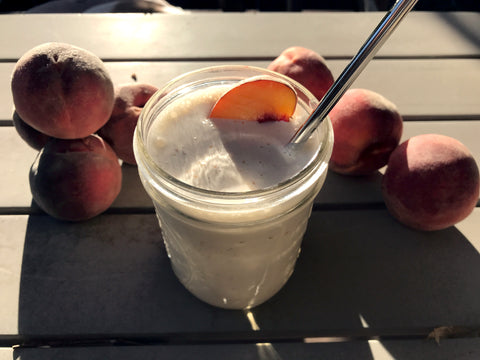 RedCamper Colorado Whiskey Peach Deliciousness Jam milkshake in a mason jar on sunny picnic table 