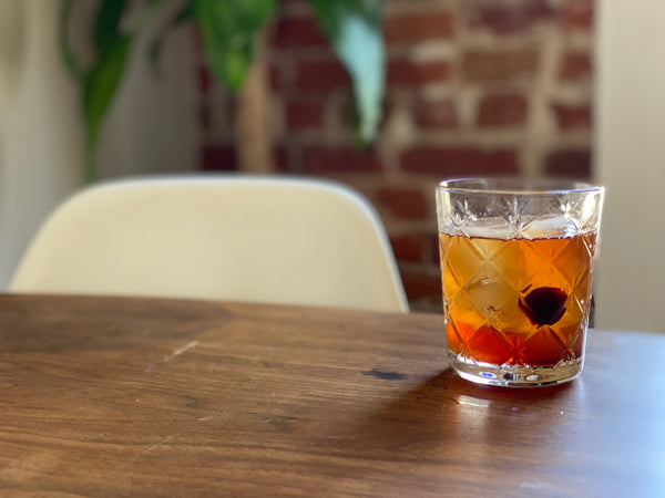 mocktail old fashioned on wood table