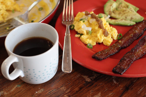 Jam Glazed Bacon with Tequila Jalapeño Deliciousness served with Eggs and Avocado and fair trade coffee 