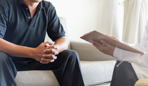 man talking with doctor