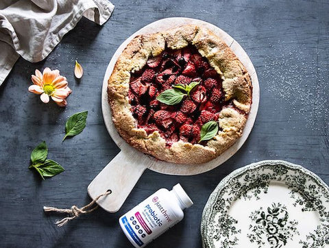 gluten-free strawberry pesto galette with Just Thrive Probiotic bottle