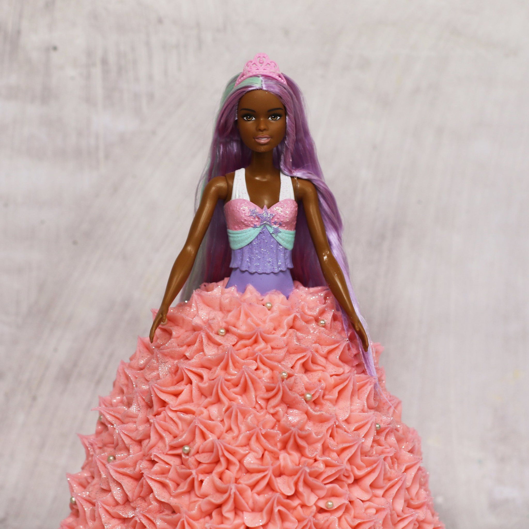 barbie doll with pink dress