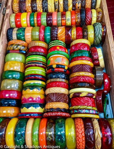 A large colourful collection of bakelite bangles