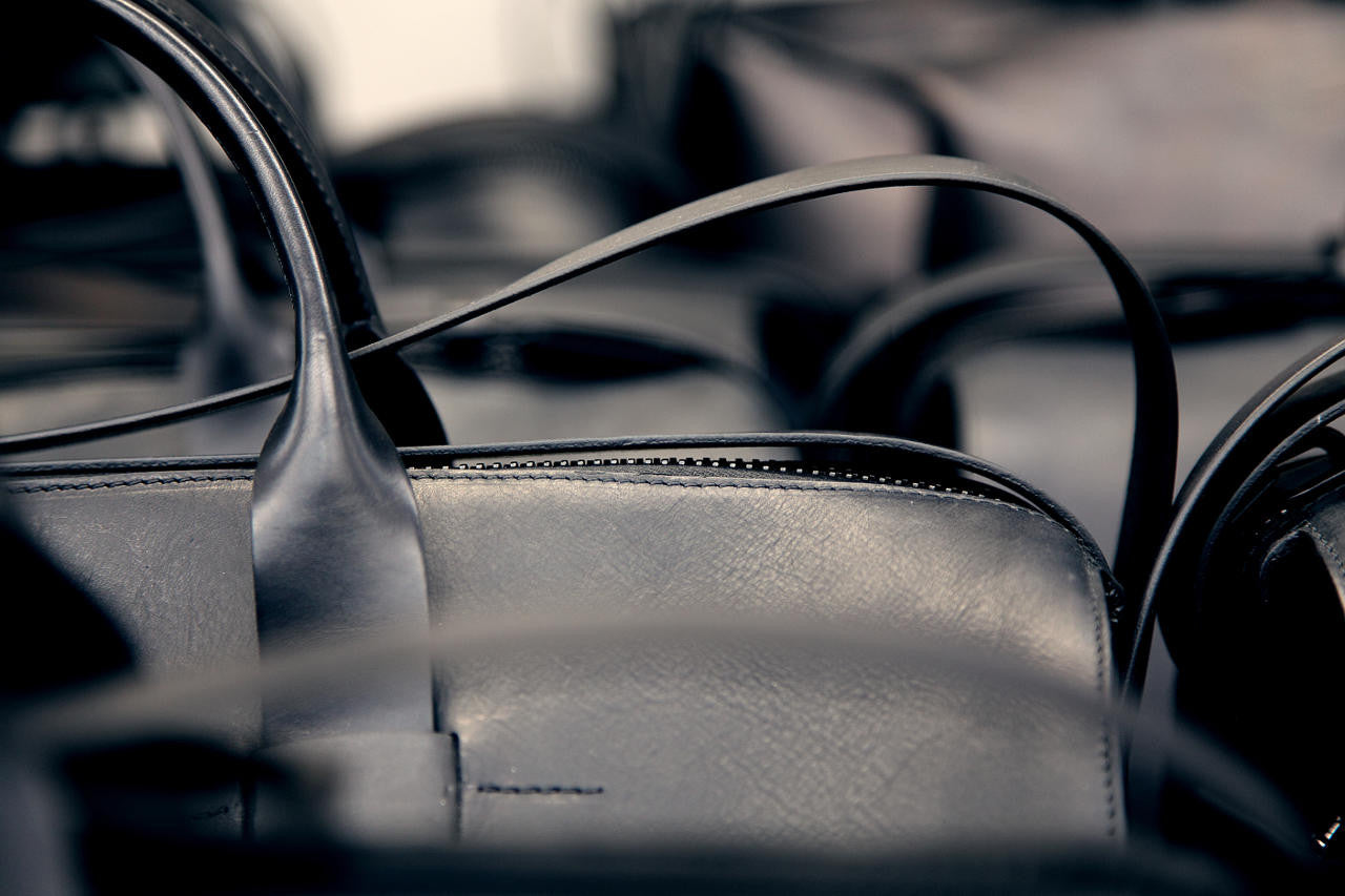 Luxurious black leather on men's day bag