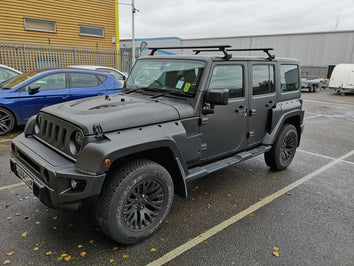 Thule WingBar Evo Roof Bars fitted to a Jeep Wrangler