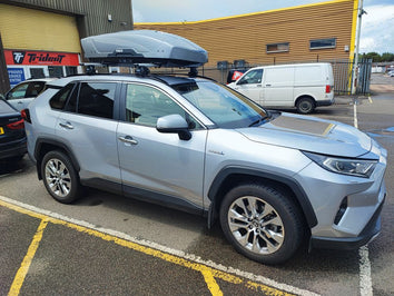 A Thule Motion XT Roof Box fitted to a Toyota Rav4