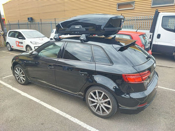 A Thule Motion XT Roof Box fitted to an Audi A3 Sportback