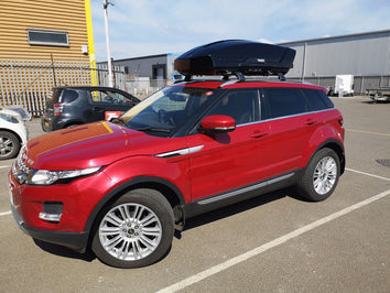 A Thule Motion XT Roof Box fitted to an Range Rover Evoque