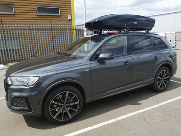 A Thule Motion XT Roof Box fitted to an Audi Q7