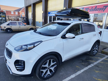 A Thule Ocean Roof Box fitted to a Kia Sportage