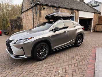 A Thule Motion XT Roof Box fitted to a Lexus RX