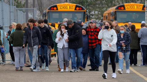 Parents and students reacting as they get off buses from Oxford shooting