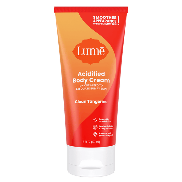 Orange Lume clean tangerine acidified body cream against a white background