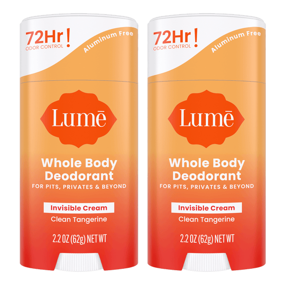 Two orange cream stick deodorants in the scent Clean Tangerine