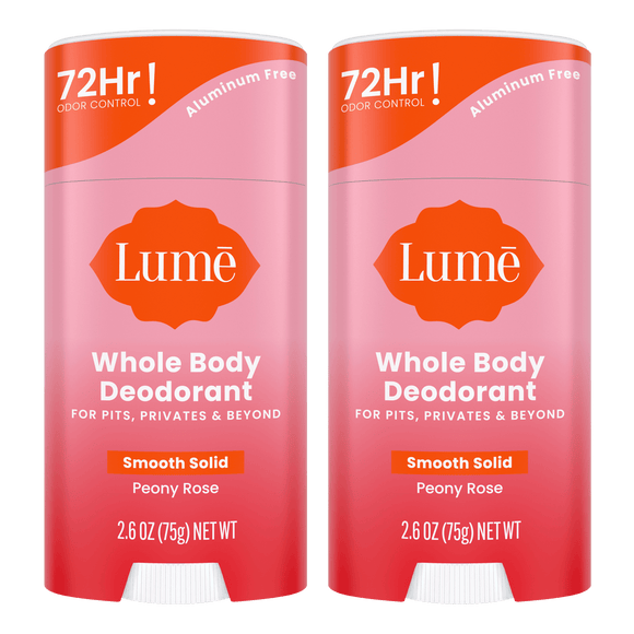 Two pink sticks of solid deodorant in the Peony Rose scent