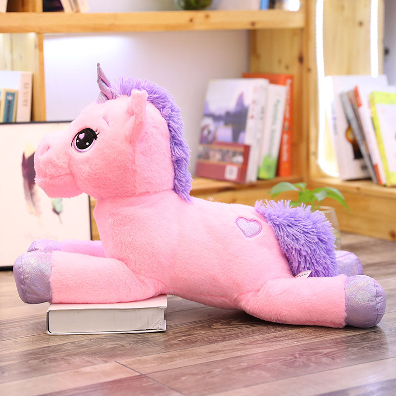 giant stuffed pink unicorn
