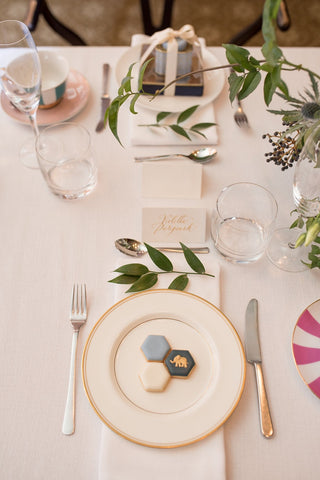 place setting with cookies arranged on plate