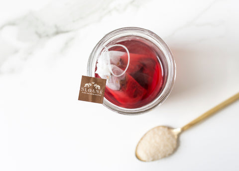 crimson berry loose leaf tea infusing in jar