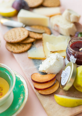 tea and cheese pairing charcuterie board close up