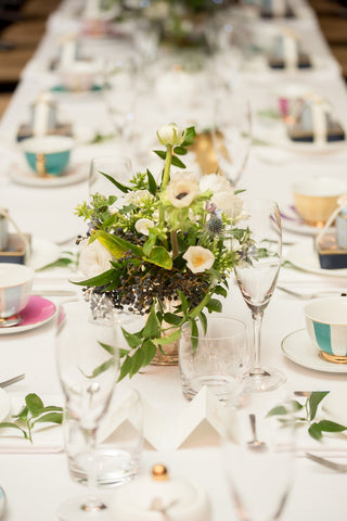 tablescape close up with floral arrangement
