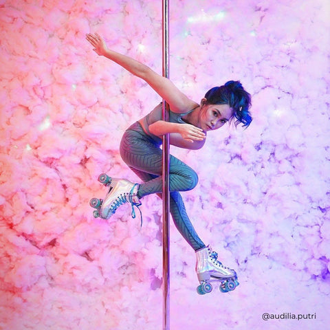 pole dancer in sticky pole wear