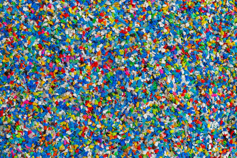 Colorful granules made from crushing plastic items