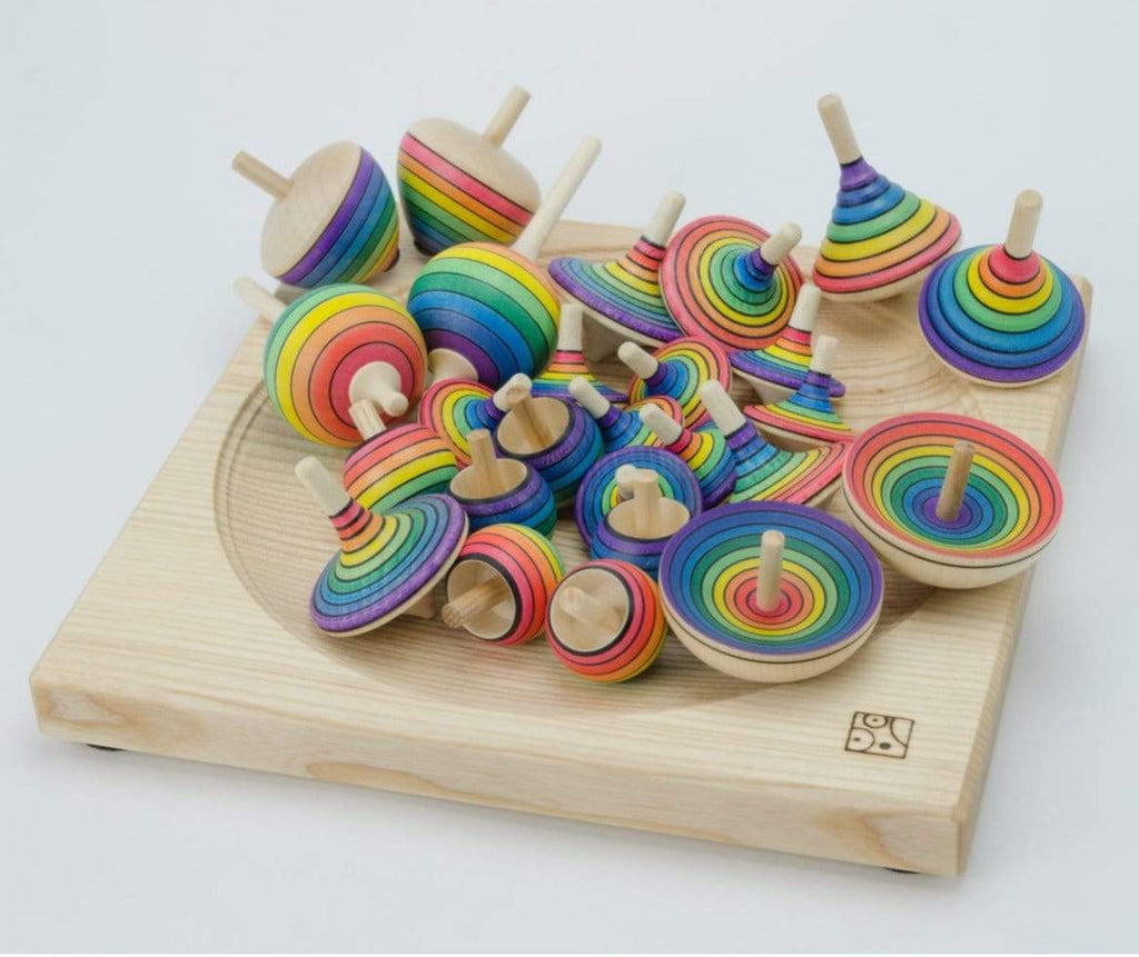 large wooden spinning tops