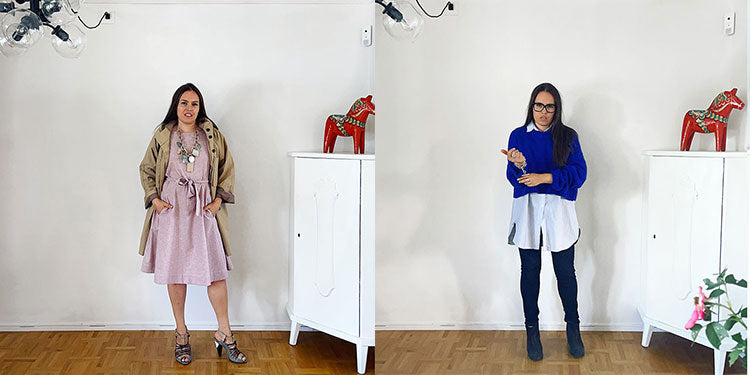 Woman wear pink linen dress with tied belted waist and a blue cotton collared shirt layered with a sweater