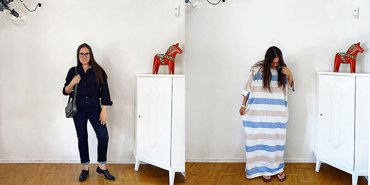 Woman wearing glasses and black flannel button up shirt, woman wearing oversized kaftan with large blue white and tan horizontal stripes 