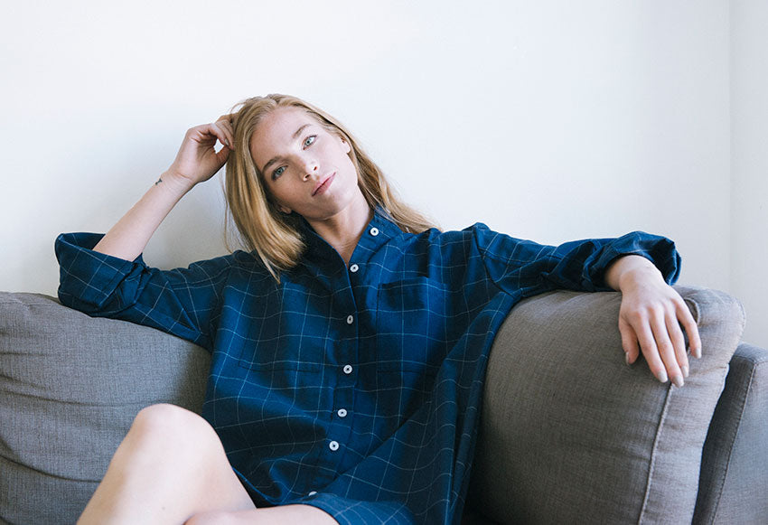 Model sitting in the Placket Sleep Shirt Navy Windowpane Flannel 