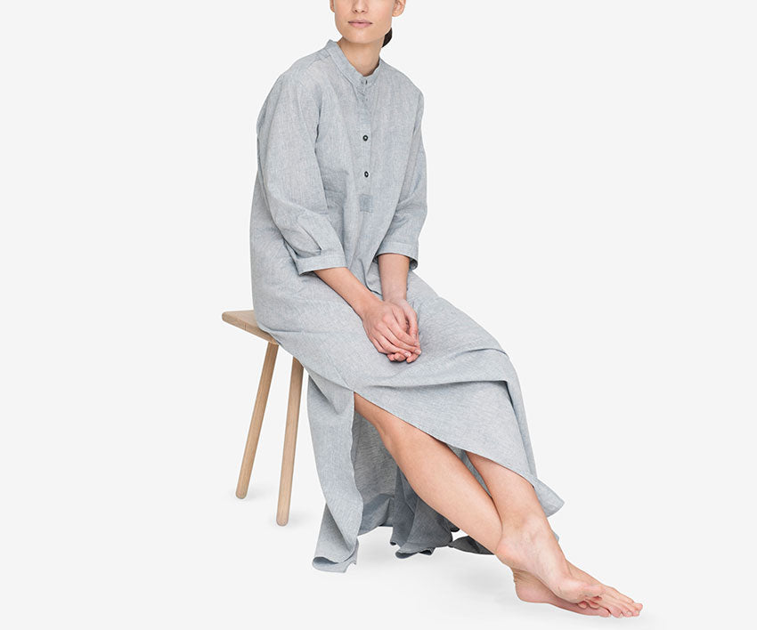 Model sitting on stool in Full Length Sleep Shirt in Smoke Linen Blend