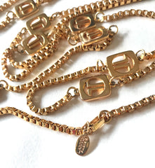 Vintage Lanvin golden chain long necklace with logo motif charms. Rare Lanvin vintage jewelry. Long necklace. 0403311
