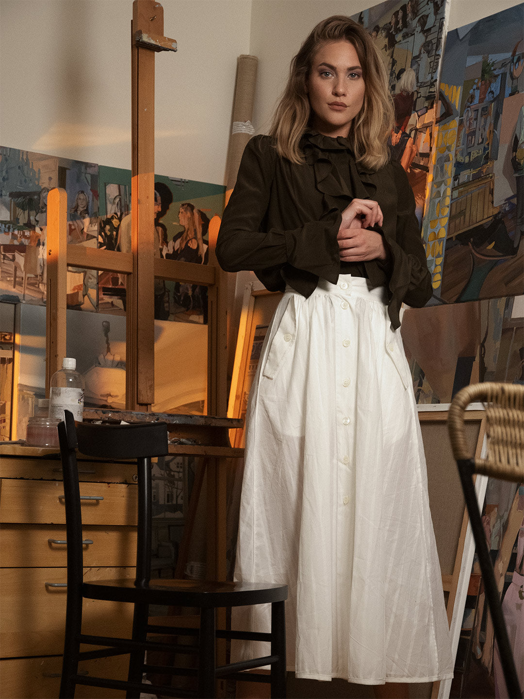 Alice Herbst wearing Anima blouse and Laura skirt