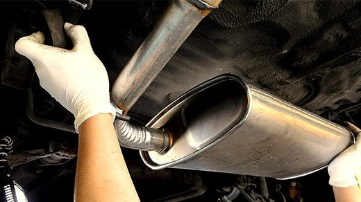 How much to change the car exhaust in a shop