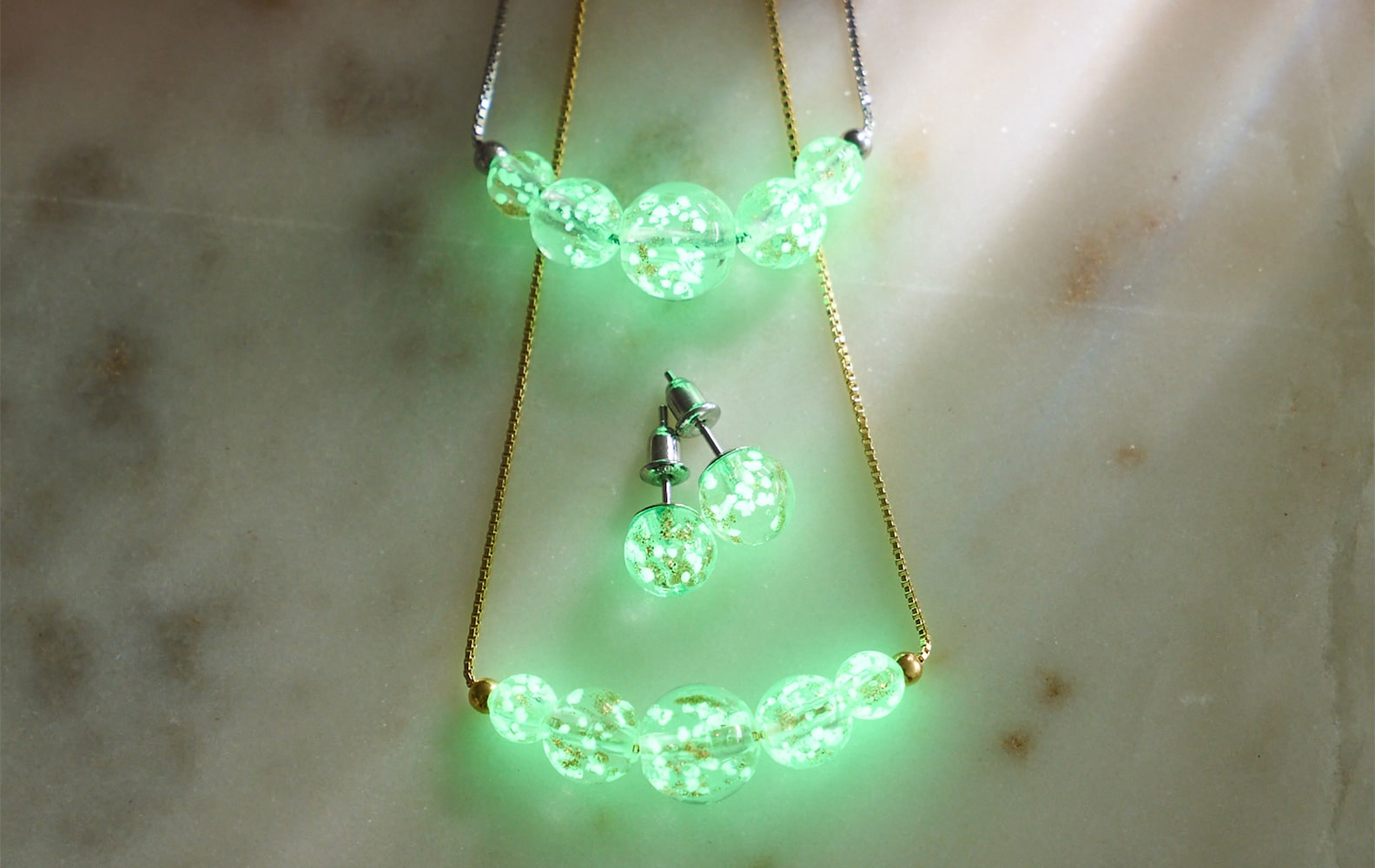 NOGU Glow in the Dark Firefly Glass necklace and earring set