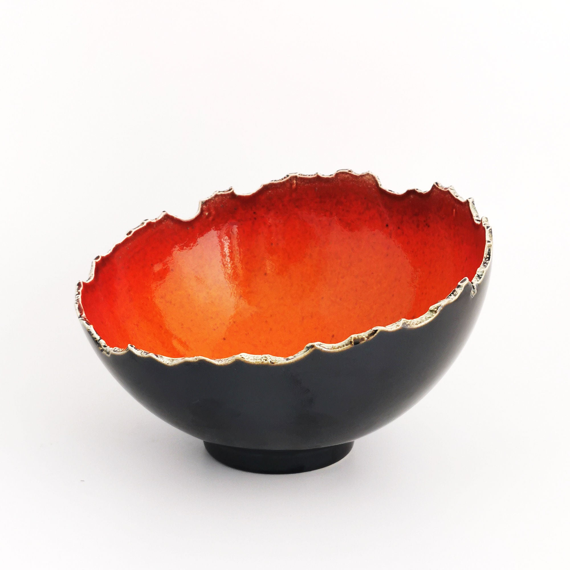 red ceramic fruit bowl